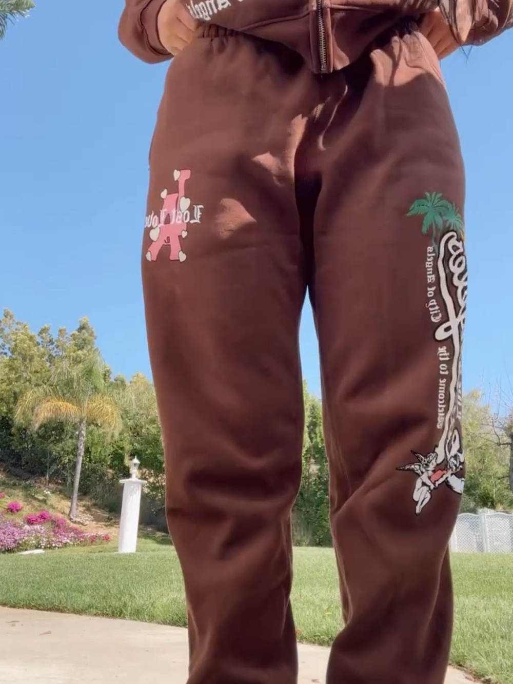 Brown Sweatpants and hoodie and animal print pajama pants